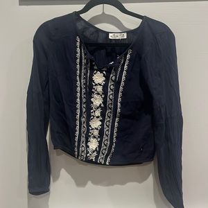 Navy blue Hollister blouse with white details
